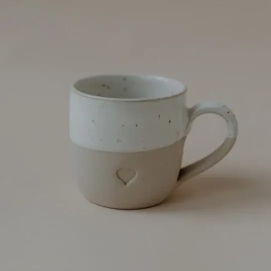 pot-091_esotasse_herz_phot.webp